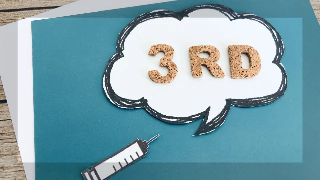 注射器と「3RD」の文字が描かれた吹き出しカード